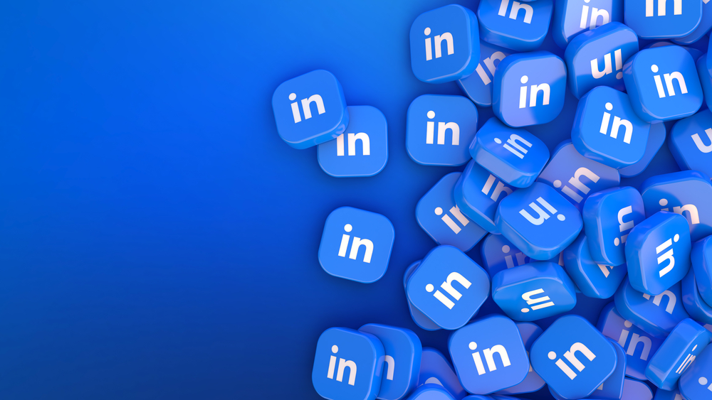 3D rendering a lot of linkedin square badges iover blue background -  DirectPayNet