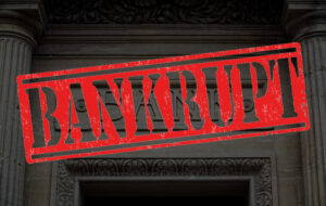 "Bankrupt" stamped in red over a traditional marble bank