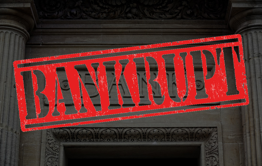 "Bankrupt" stamped in red over a traditional marble bank