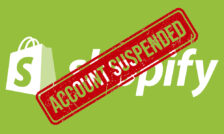 Green "Shopify" logo and text under a large red "Account Suspended" stamp
