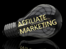 Light bulb on a black background wiht the words "AFFILIATE MARKETING" inside