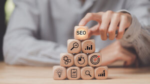 Marketer showing SEO concept,optimization analysis tools, search engine rankings, social media sites based on results analysis data,Website Search Optimization ,Interesting web rankings from visitors