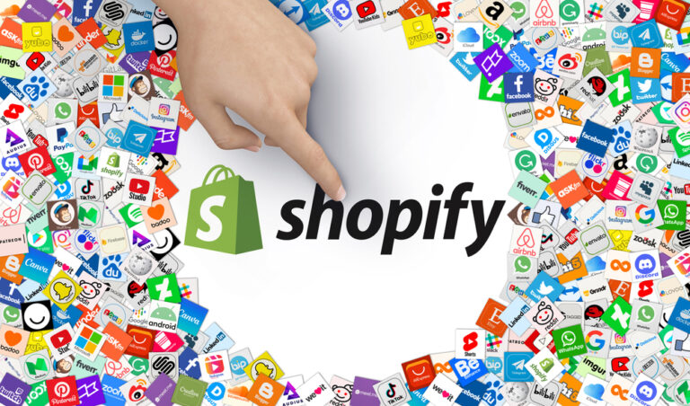 "Shopify" logo in a white circle surrounded by various icons and a finger pointing at it